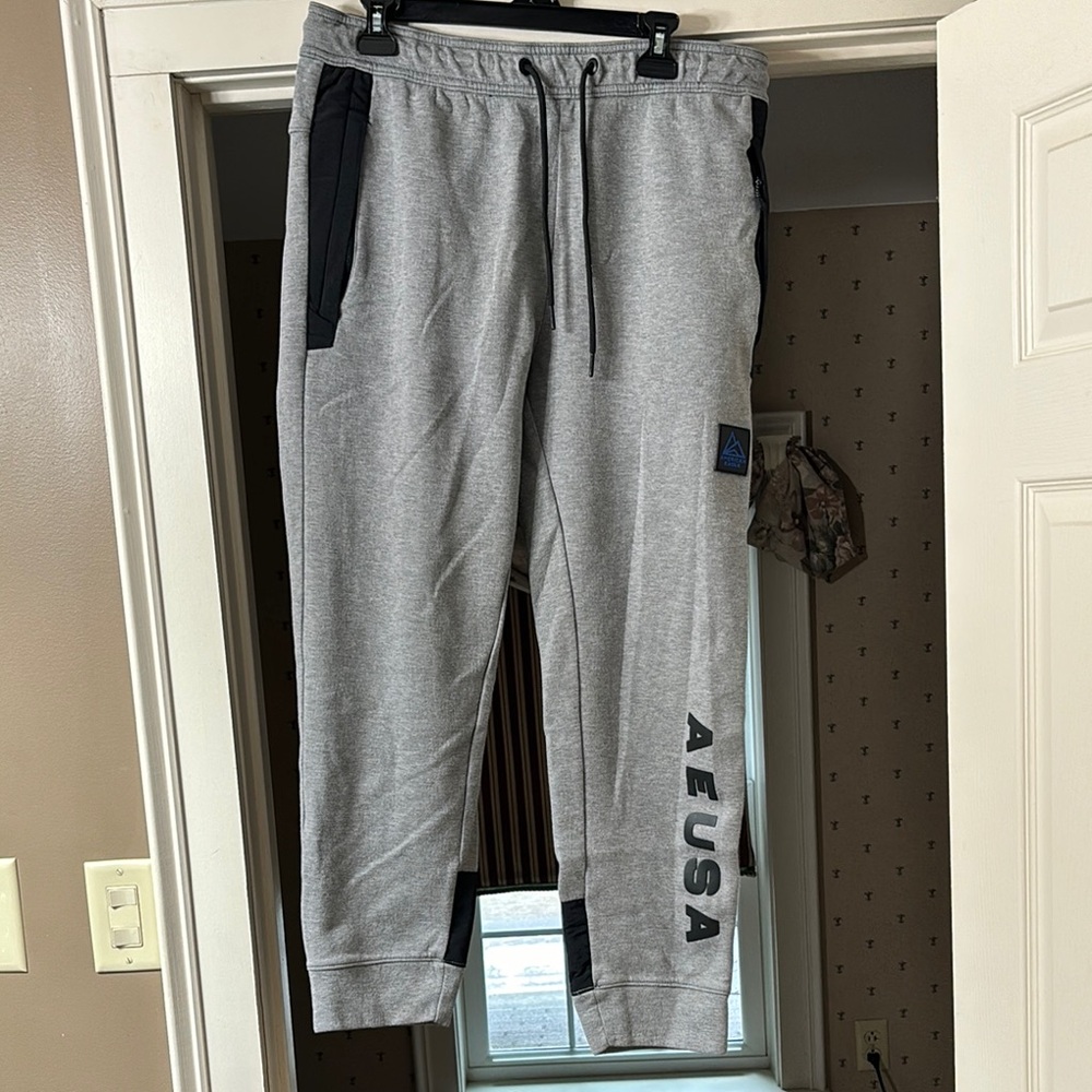 Gray Sweatpants with Elastic Waistband Cuffed Ankles and Relaxed Fit